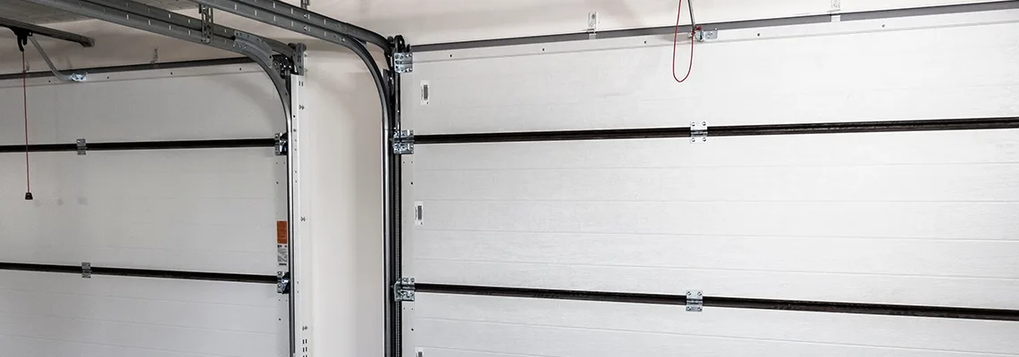 Fix Folding Garage Door Jerking in Jacksonville